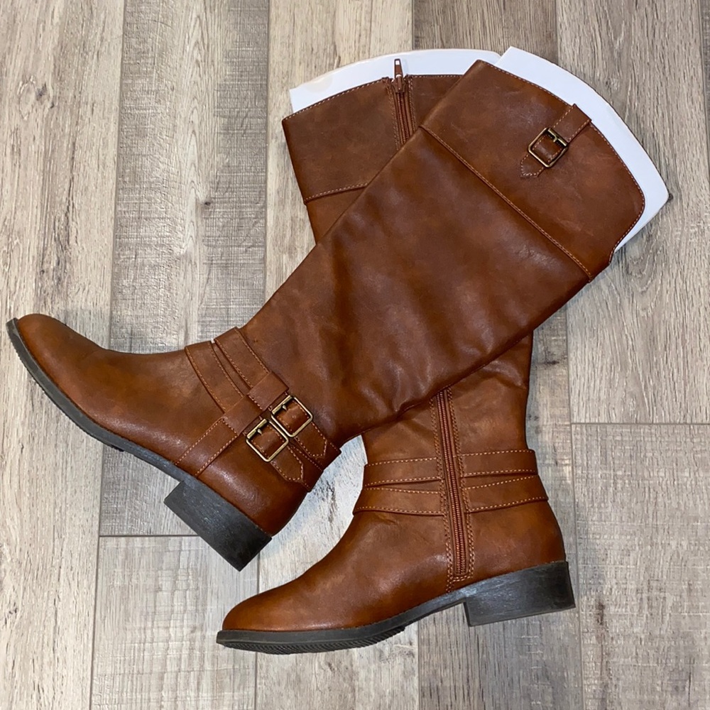 Tall tan boots.